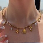 گردنبند استیل اویزدار صدف و ستاره دریایی رنگ طلایی