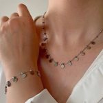 نیمست گردنبند و دستبند پولکی استیل و رنگ سیلور ثابت